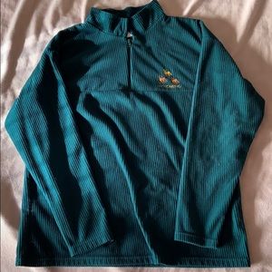 Forest green jacket with golden Wyoming lettering